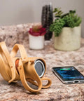 Efficient Wood Bending Kit With Steam Box Plan, curved wood sculpture beside a smartphone on a marble surface