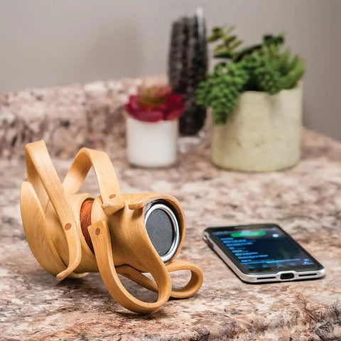 Efficient Wood Bending Kit With Steam Box Plan, curved wood sculpture beside a smartphone on a marble surface