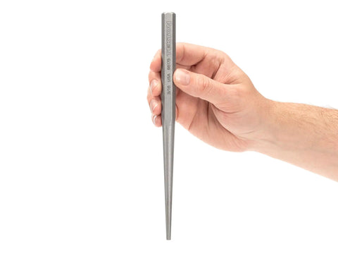 Hand holding Workhorse Three Sixteenth Inch Alignment Punch For Precise Hole Alignment In Multi Part Assembly Self Centering Nose Guides Holes
