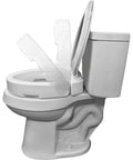 Image showing Hinged Round Raised Toilet Seat Riser With 3.5 Inch Lift installed on a white toilet, demonstrating hinge mechanism.