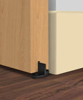 Barn Door Floor Guides 2 Pack Bottom Guide Floor Mount For Sliding Doors T Shape Track Hardware Black Durable Solid Steel Build With Black Powder Coat Sleek Low Profile Floor Guide System installed on wood floor