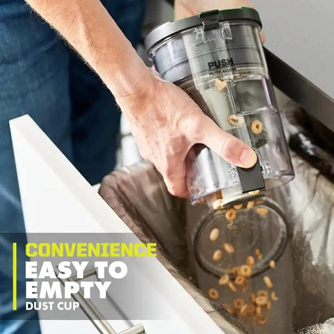 User empties the easy-to-empty dust cup of the Heavy Hitting Cordless Stick Vacuum Cleaner With 18 Volt Battery And Quick Charger.