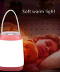 USB Rechargeable Night Light For Kids, pink lantern glowing softly by sleeping child, ideal for camping or bedroom
