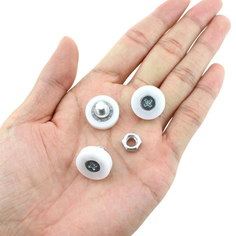 8 Pack 19Mm Drawer Rollers With Nuts Smooth Gliding Replacement Pulleys For Cabinets Sliding Doors And Furniture Heavy Duty Pom Nylon Wheels Silent Ride Hassle Free Install on hand showing parts.