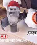 DT-DIATOOL diamond core drill on tile surface; gray/red drill with guard, gloved hands
