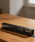 Rock Solid 24 Port Network Patch Panel For 19 Inch Rack Mount With Standard Rj45 Jacks Heavy Duty Cable Management Gear Total Wire Wrangler For Server Rooms And It Closets Black Finish on wooden table.