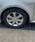 Car on Interlocking 12x12 Outdoor Deck Tiles Grey, 9 Sq Ft Pack Of 9, Waterproof flooring for patio, porch, poolside, balcony.