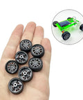 Dope Mini 16mm Toy Car Wheel Set With 10 Shaft Axles in hand and RC model car with rubber wheels in silver finish