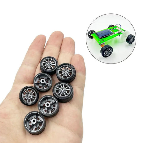 Dope Mini 16mm Toy Car Wheel Set With 10 Shaft Axles in hand and RC model car with rubber wheels in silver finish