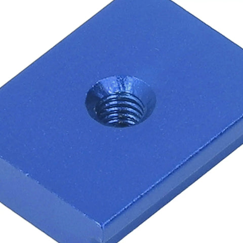 Close-up of a blue Four Pieces T Slot Nut Aluminum Alloy for 30 Series M6 Sliding Slot Nut, ideal for woodworking benches and table saws.