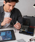 Trusted 37 Piece Glasses Repair Kit For Specs And Shades Featuring Precision Screwdrivers Micro Screws being used by a man fixing glasses.