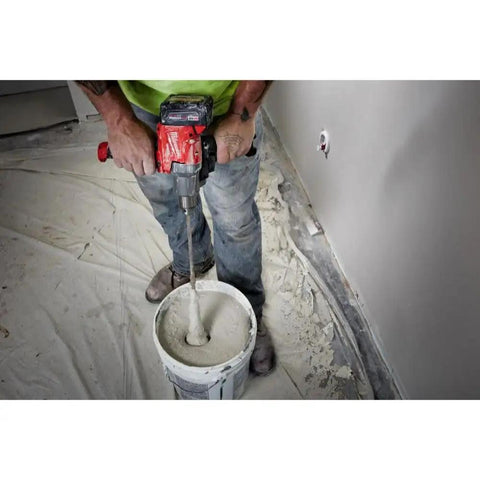 18V Cordless Mud Mixer Bare Tool for Drywall Mud Plaster and Concrete Projects in use on jobsite floor by worker