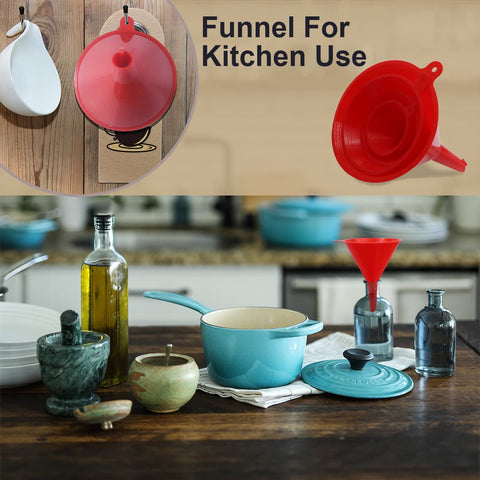 Four Piece Plastic Funnel Set With Nesting Design in Red for Kitchen, cooking pots and bottles in background. Kitchen use focus.