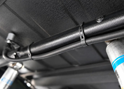 Outdoor UV Resistant Rubber Cable Zip Tie Mount Kit with black nylon mounts securing cables under a vehicle