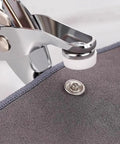 Snap Fasteners Kit With 100 Sets Of Metal Snaps And Pliers Tool for DIY crafts clothing sewing hats, shown in use on fabric.