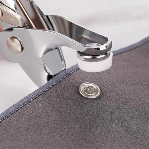 Snap Fasteners Kit With 100 Sets Of Metal Snaps And Pliers Tool for DIY crafts clothing sewing hats, shown in use on fabric.