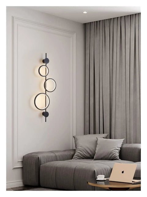Top Shelf Modern Wall Sconce With Straight Fire Led Glow And Hella Sturdy Iron Frame Perfect For Bedroom Bedside Or Tv Backdrop Ambiance Easy Surface Mount And Super Durable Daily Lighting, sleek black design illuminating cozy living room.