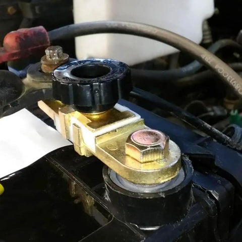 Close-up of installed 12V Side Post Battery Disconnect Switch Kit For Cars Two Pack Quick Disconnect Battery Cut Off And Kill Switch