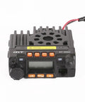 Close-up of 20W dual band mobile ham radio for 2m and 70cm with car transceiver kit showing front controls and wiring connection.
