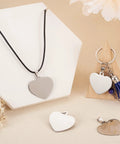 Front view: silver 33mm heart-shaped stainless steel pendant with a snap-on bail for DIY necklaces and earrings.