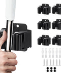 Six Piece Stainless Steel Broom And Mop Holder Set With Wall Mount Screws Boss Grade Heavy Duty Matte Black Tool Organizer Rack For Brooms Mops Rakes And Shovels Handles shown in use with screws and mounts.