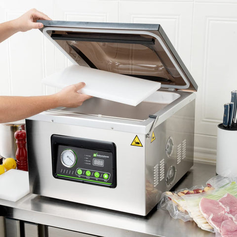 Pro Grade Chamber Vacuum Sealer Packs A Solid Punch With Sturdy 16 Inch Seal Bar And Whisper Quiet Motor. User places cutting board inside.