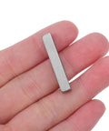 Badass 20 Pack Stainless Steel Parallel Drive Key Kit With High Tensile Strength And Rust Proof Build Flat End Pins For Power Transmission Gearbox Motor Shaft Jobs That Rock And Hold Firm Tight Tolerance Fits For Daily Workbench Use Today, stainless steel key in hand