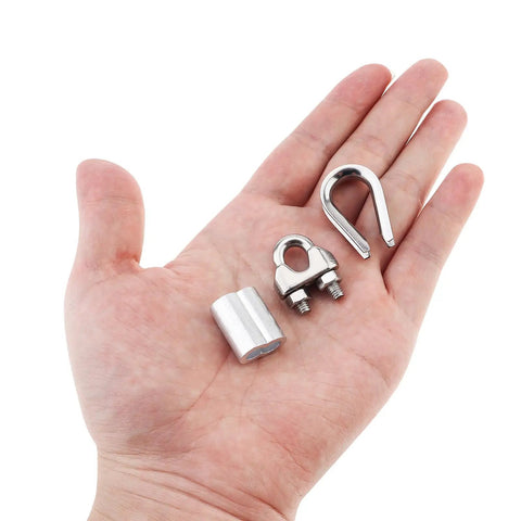 Hand holding components from Beefy Heavy Duty Eighteen Piece Three Sixteenth Inch Wire Rope Accessory Kit With Six M5 Cable Clips, Six Stainless Steel Thimbles, And Six Aluminum Crimping Loop Sleeves For DIY Rigging, Marine, And Outdoor Projects