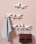 Five Hook Wall Mounted Coat Rack With Decorative Bird Design Built To Hold Heavy Gear Smoothly Perfect For Entryway And Bedroom Storage To Keep Your House Neat And Seriously Slick In Blue, featuring white birds and a gray branch.
