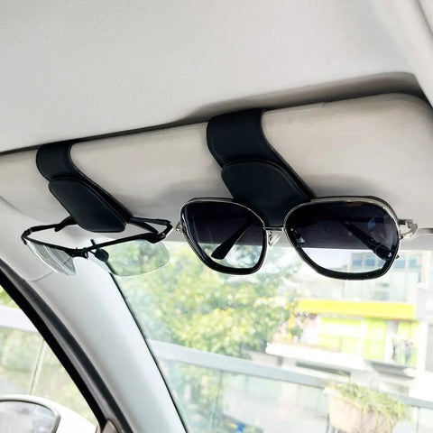 Keep Your Ride Looking Sharp With This Two Pack Magnetic Sunglass Holder Upgrading Leather Visor Clip securely holds sunglasses.