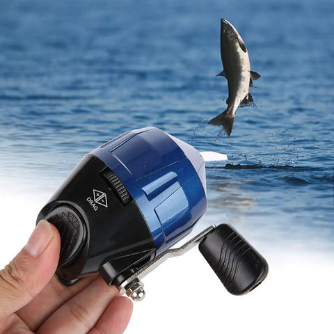 Slingshot Style Spincast Fishing Reel Replacement Accessory For Outdoor Travel Ultra Lightweight And Portable With Easy Operation Push Rear Button Before Cast To Prevent Line Tangles Blue held by hand next to jumping fish