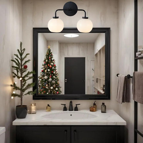 Double Glass Globe Wall Sconce, 17 Inch Sleek Modern Design In Matte Black above bathroom mirror with Christmas decor