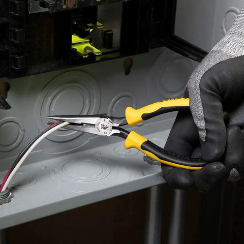 Person using Long Nose Side Cutting Pliers 6-3/4-Inch Pro Grade with Induction Hardened Cutting Knives in electrical work