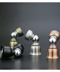 Stylish Stainless Steel Magnetic Door Stopper That Keeps Doors Securely Locked In Place For Homes And Offices Without Damage, A Total Game Changer For Preventing Slamming And Securing Your Space Effortlessly. Four metal finish variants in focus.