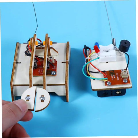 Hands On Telegraph Model Kit For Kids And Students, Fun Wood Craft DIY Science Experiment showing wooden transmitter and receiver.