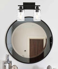 Two Light Matte Black Wall Sconce With Clear Hammered Glass for Modern Bathroom Vanity Wall Lamp for Mirrors Cabinets or Powder Room Up or Down Mount Today, mounted above a round mirror