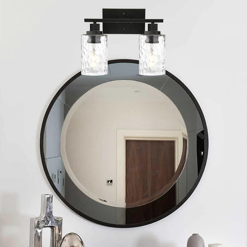 Two Light Matte Black Wall Sconce With Clear Hammered Glass for Modern Bathroom Vanity Wall Lamp for Mirrors Cabinets or Powder Room Up or Down Mount Today, mounted above a round mirror