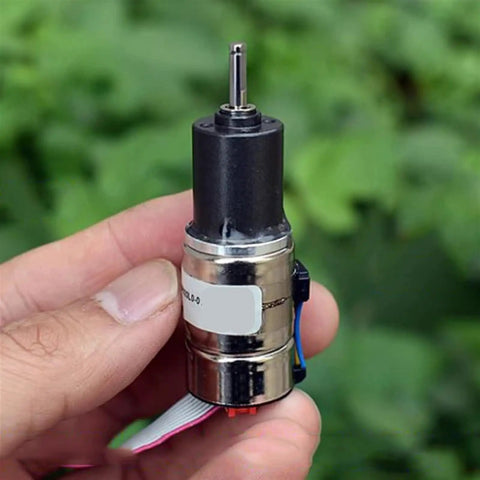 Person holding planetary reducer gear motor with 16mm precision ultra high torque micro full metal gearbox for precise automation