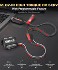 Beefy 62Kg Torque Waterproof Steering Servo and programmer on desk for RC cars