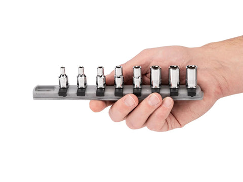 Hand holding One Quarter Inch Drive Shallow External Star Socket Set On Rail Eight Piece With E4 E5 E6 E7 E8 E10 E11 E12