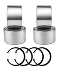 Two metal wheel bearings with inner and outer races and five black circlips