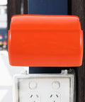 Heavy Duty Outdoor EV Charger Cover With Dual Outlet Socket Protector All Weather Foldable Shield For Electric Vehicles protects outlet with bright orange shield.