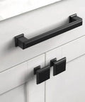 10-Pack Matte Black Cabinet Knobs And Drawer Pulls - Zinc Hardware For Kitchen Cabinets shown installed on white cupboards