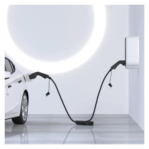 Heavy Duty Electric Vehicle Charger Cable Type 2 To Type 1 Plug 32 Amp connected to a car and wallbox in a modern setting.