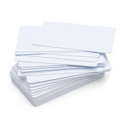 Stack of Top Shelf Blank Composite ID Cards For Retransfer Printers 30 Mil PVC PET Blend Cr80 in white badge stock.