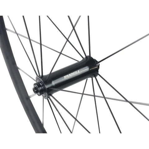 Close-up of RT030 hub and Pillar 1423 spokes on 50mm Carbon Clincher Wheelset For 700C Road Bikes Tubeless Ready With Laser Brake Surface