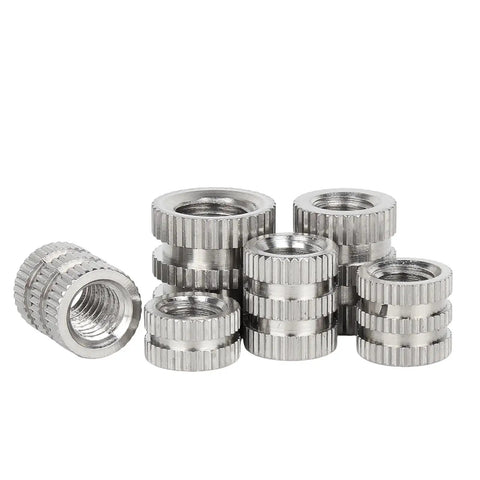 M6 Knurled Stainless Steel Insert Nuts For Injection Molding Visible in Various Angles Showing Thread and Knurled Features