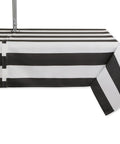 Cabana Stripe Outdoor Zippered Tabletop Cover 60 by 84 Inches Stain Resistant and Waterproof Machine Washable Easy Care for Patio Tables That Seat 6 to 8 Black shown on table