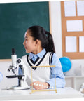 Student using Snake Shape Pendulum Energy Conservation Model Kit For DIY Science Projects in classroom, microscope visible