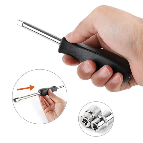 Hand holding a chrome-plated hex wrench with a black rubber grip, part of Tough As Nails 11 Pc Socket Set And Hex Wrench Kit.